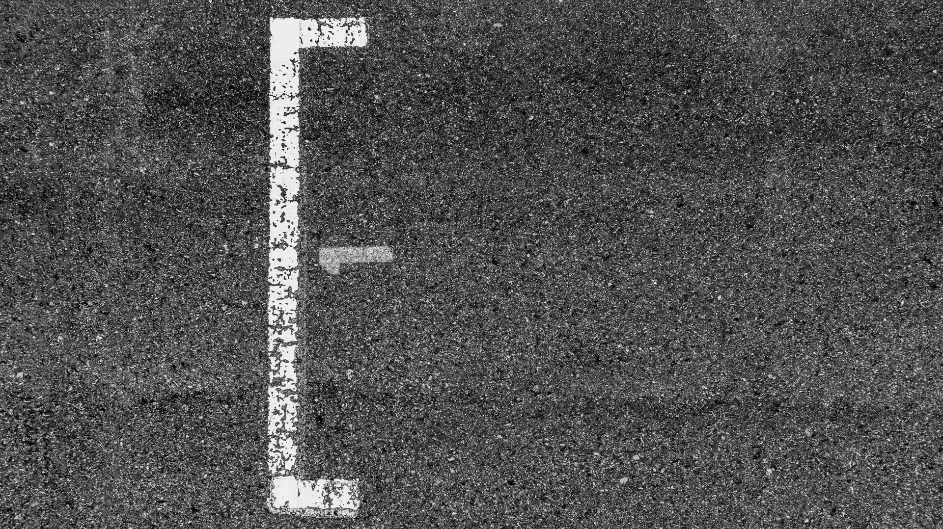 Track surface markings at a motor racing circuit
