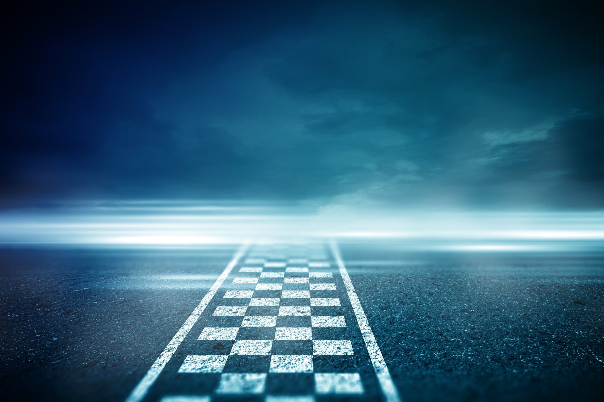 Checkered flag finish line at night